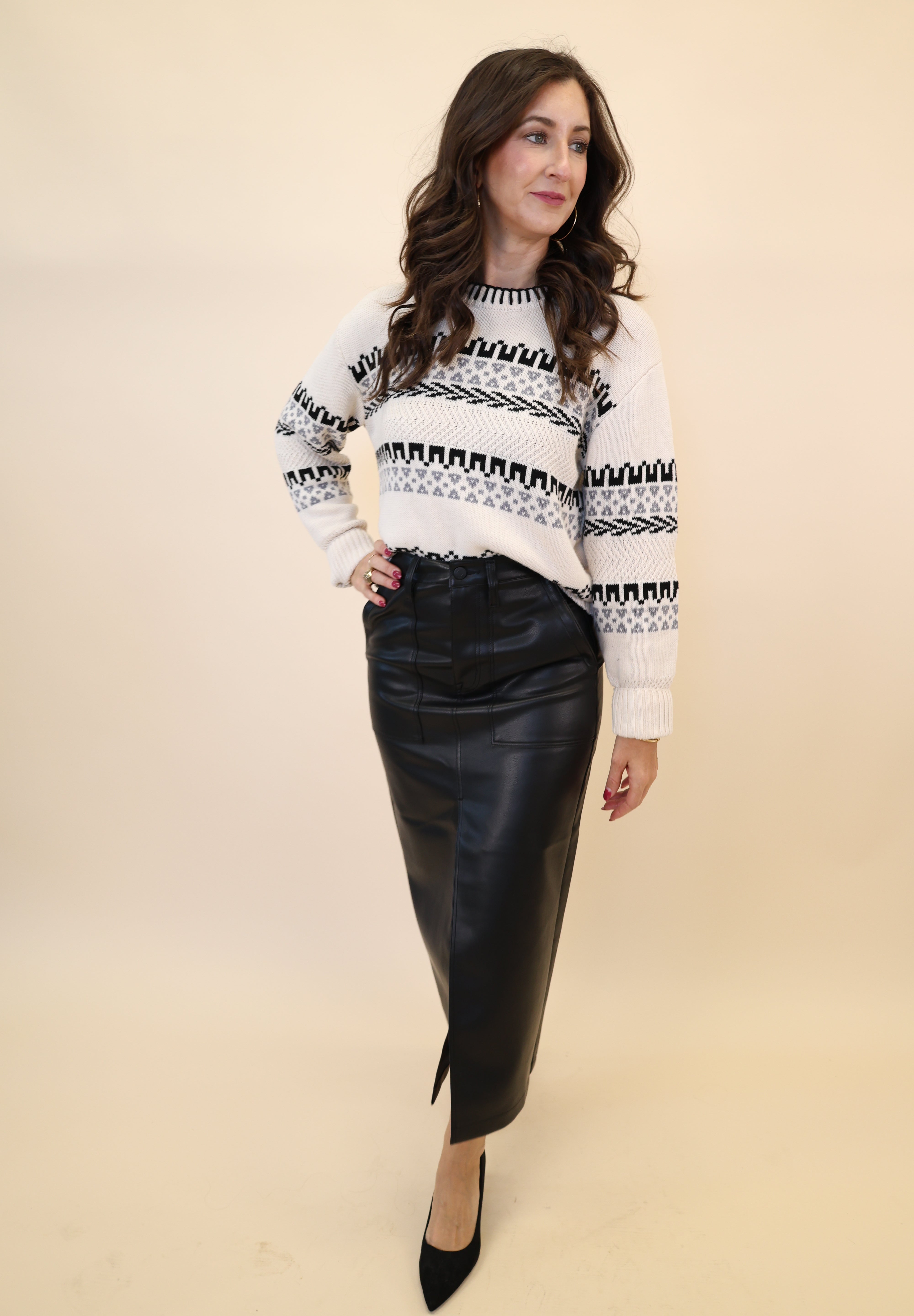 Chic Pistola Alice skirt in black faux leather, elongated midi length with utility-style details and slit front