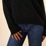 Black Dear John Ayat Sweater with a comfortable crewneck, ribbed sleeves, and modern drop-shoulder styling.