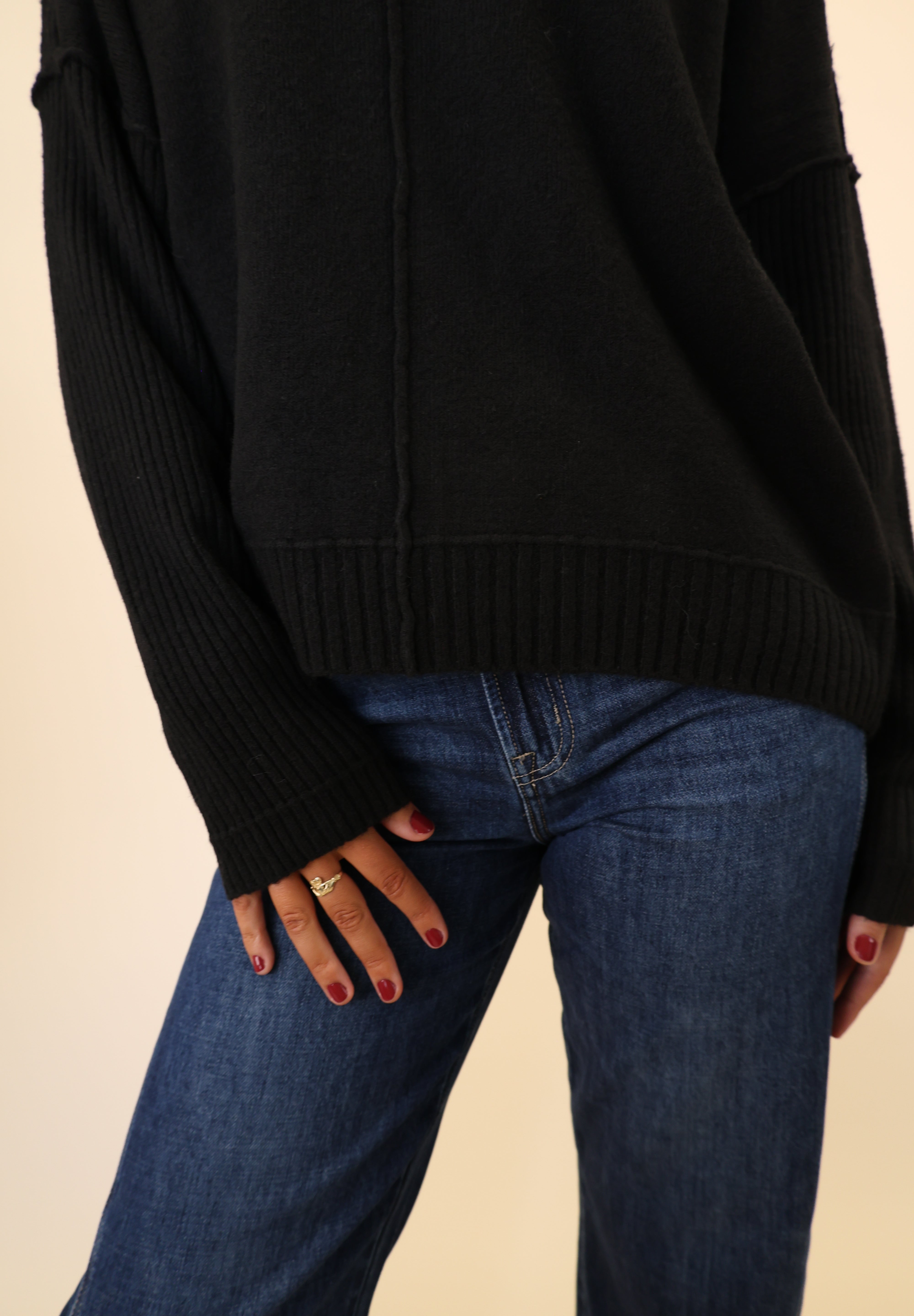 Black Dear John Ayat Sweater with a comfortable crewneck, ribbed sleeves, and modern drop-shoulder styling.