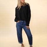Soft black Dear John sweater featuring a crewneck design, drop shoulders, and ribbed texture on the sleeves.