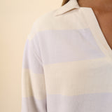 Women’s soft beige Z Supply rugby Henley, oversized fit, casual sporty style.