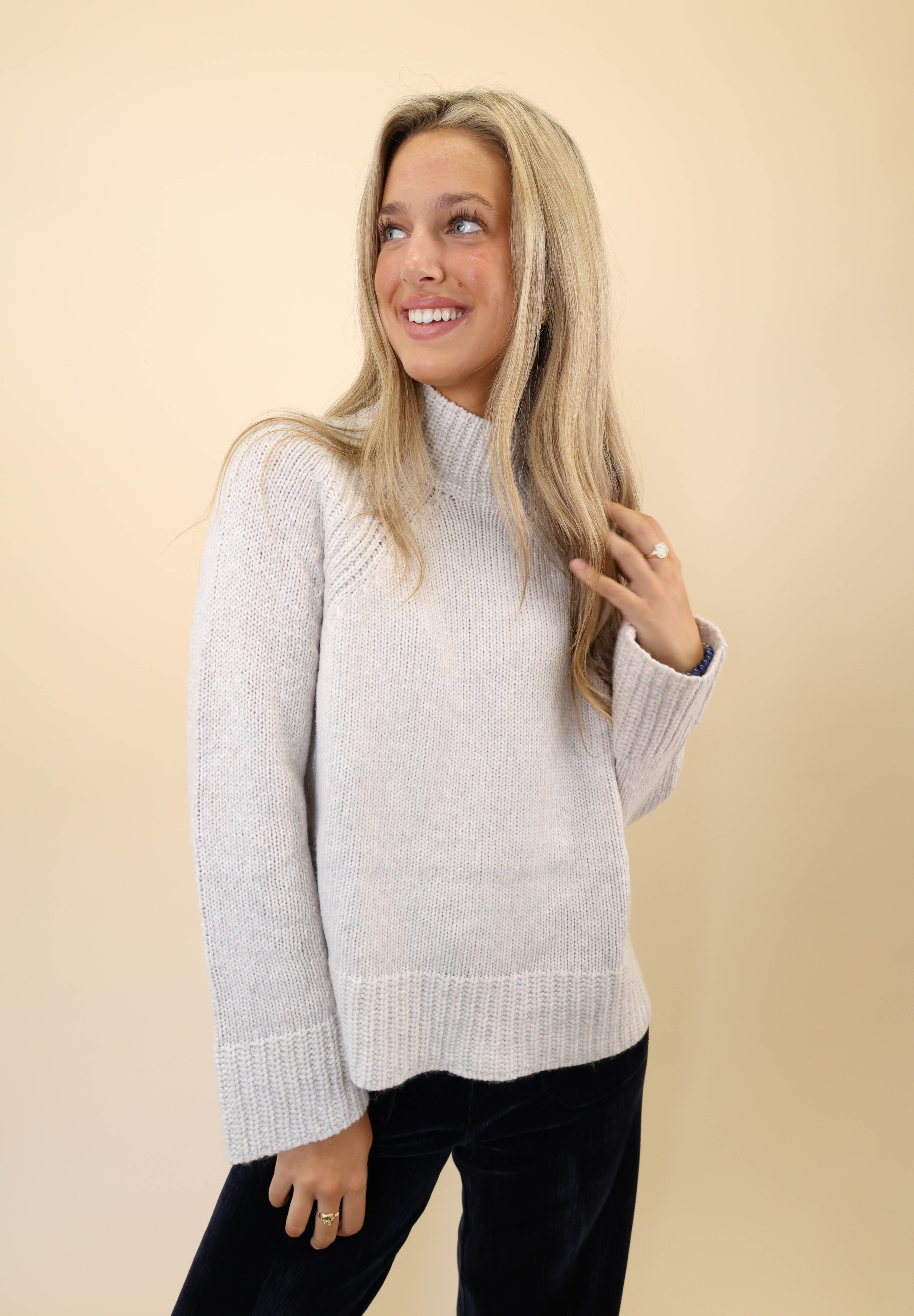 Cozy white funnel neck sweater by Z Supply with classic knit texture