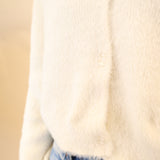 Close-up of Z Supply Sadira cardigan in soft white fluffy knit, showing lightweight texture and front buttons.