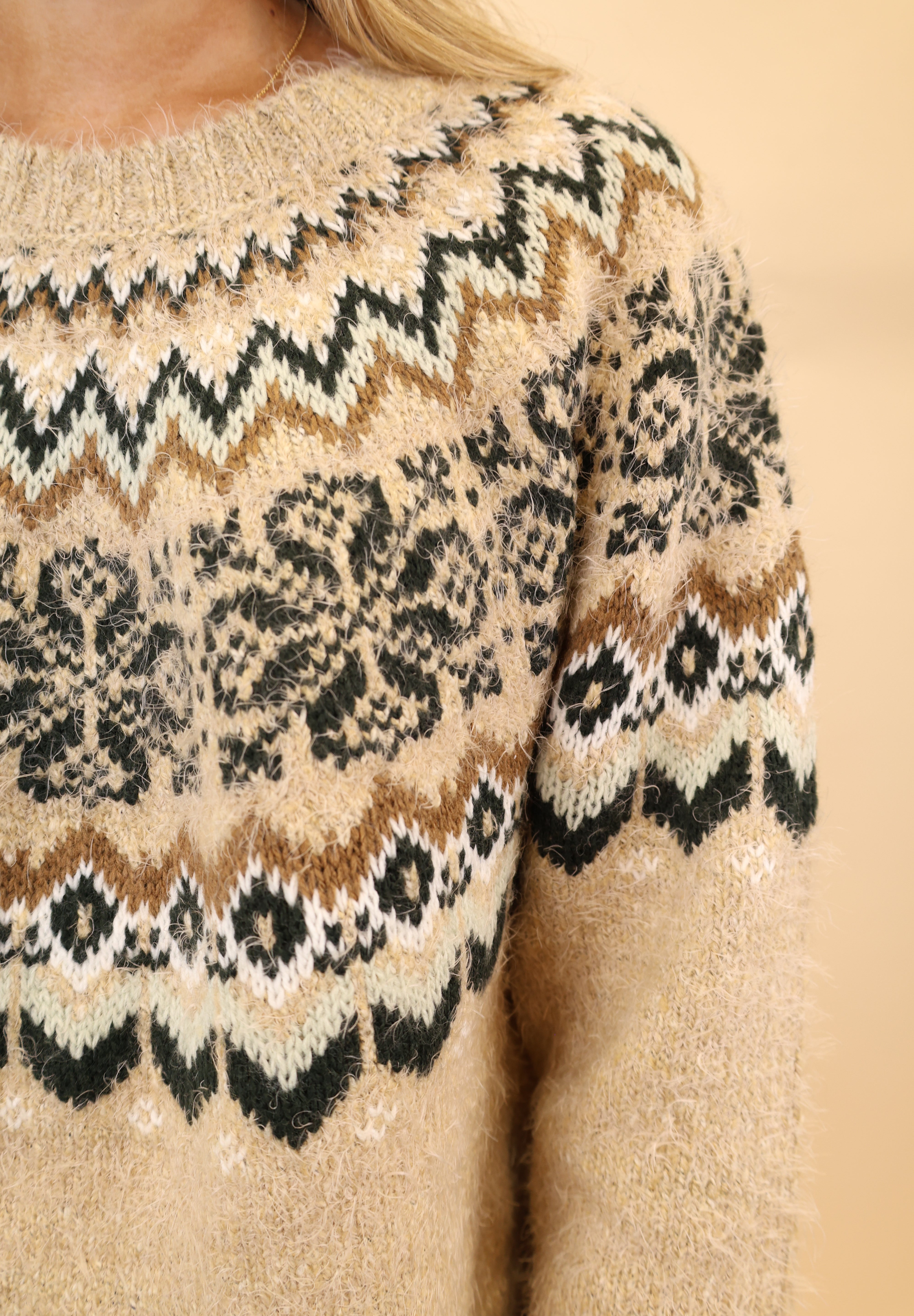 Close-up of Z Supply Kenaby sweater showing detailed Fair Isle pattern and cozy knit texture in neutral tones.