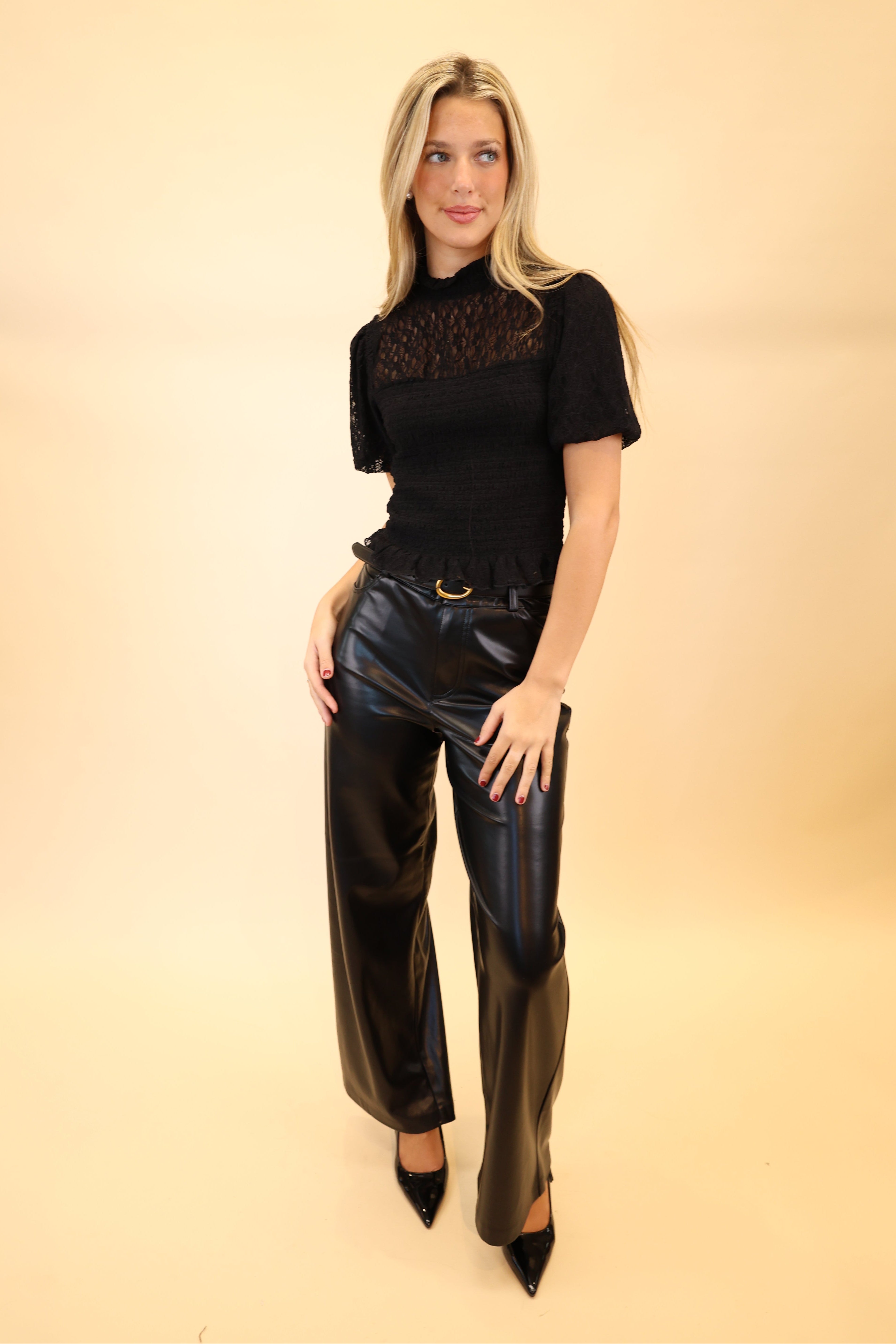 Black high-rise Z Supply Marli pants featuring soft faux leather and wide-leg silhouette.