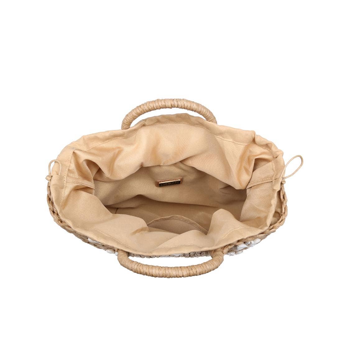 Neutral woven summer tote with braided round handles and shell embellishments for coastal style