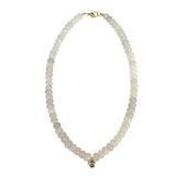 Gemelli Dori white beaded necklace with faceted beads and a CZ teardrop pendant.
