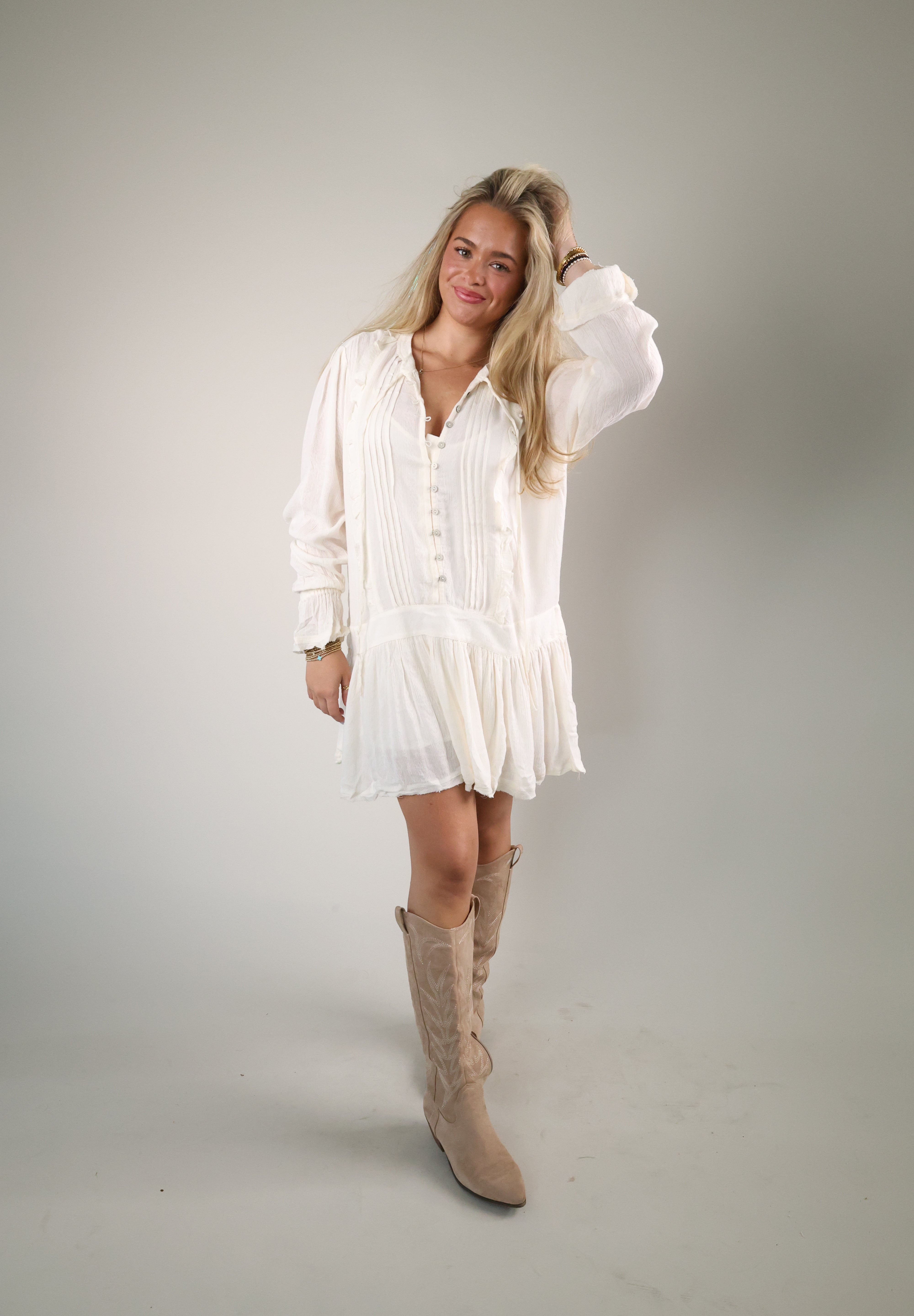 Women’s Sugar Swizzle boho mini dress with ruffle details, button front, and long sleeves