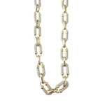 Gemelli Goldie Chain Link CZ Necklace featuring bold gold chain links accented with sparkling cubic zirconia details.