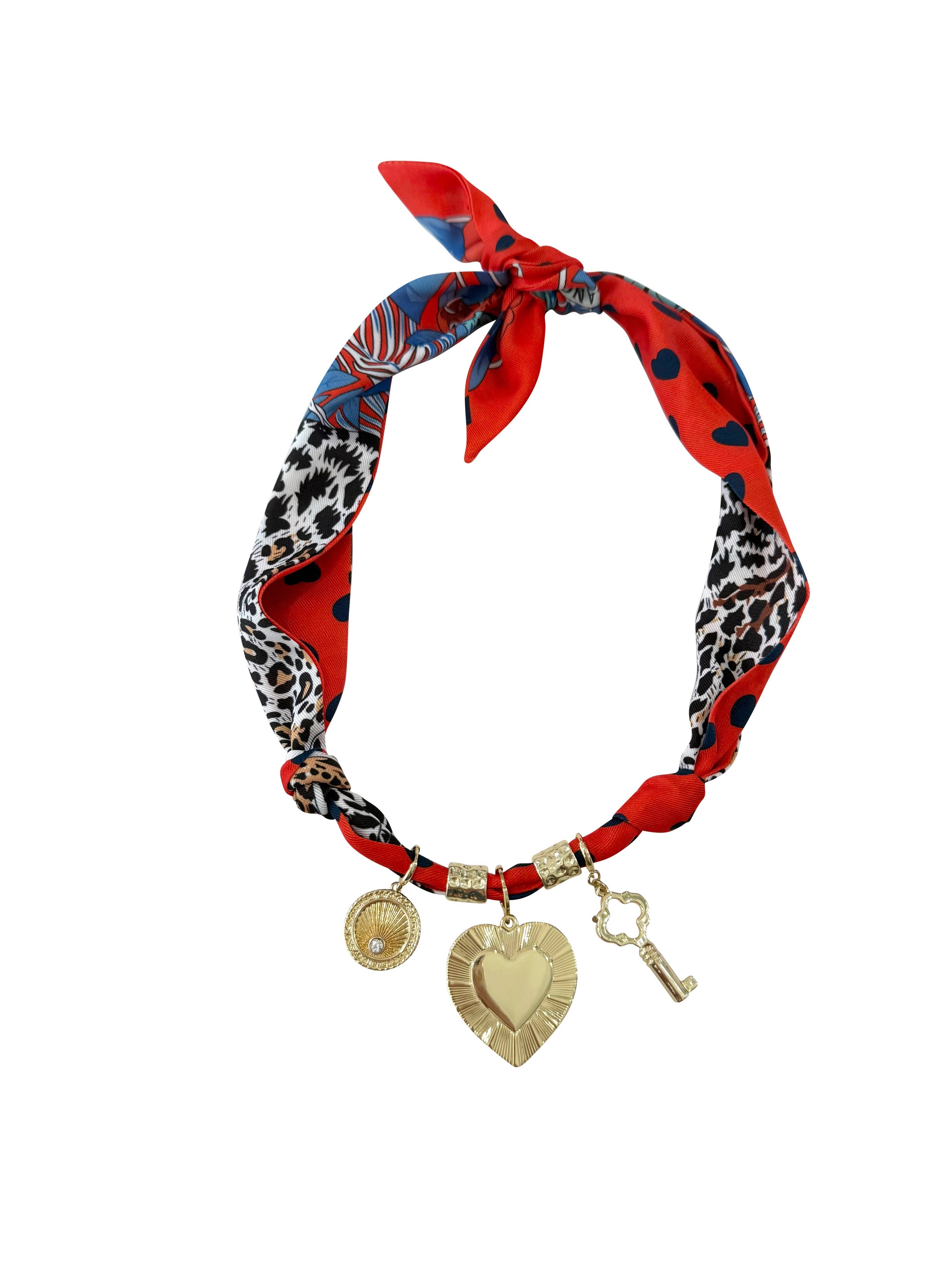 Gemelli Chan Multi Charm Scarf Necklace in soft gray and white hues, featuring a lightweight fabric design with interchangeable charms. 