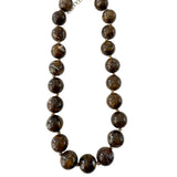 Gemelli Marby Chunky Beaded Necklace featuring large glossy marbled Brown beads, natural swirl variations, and an adjustable clasp. 
