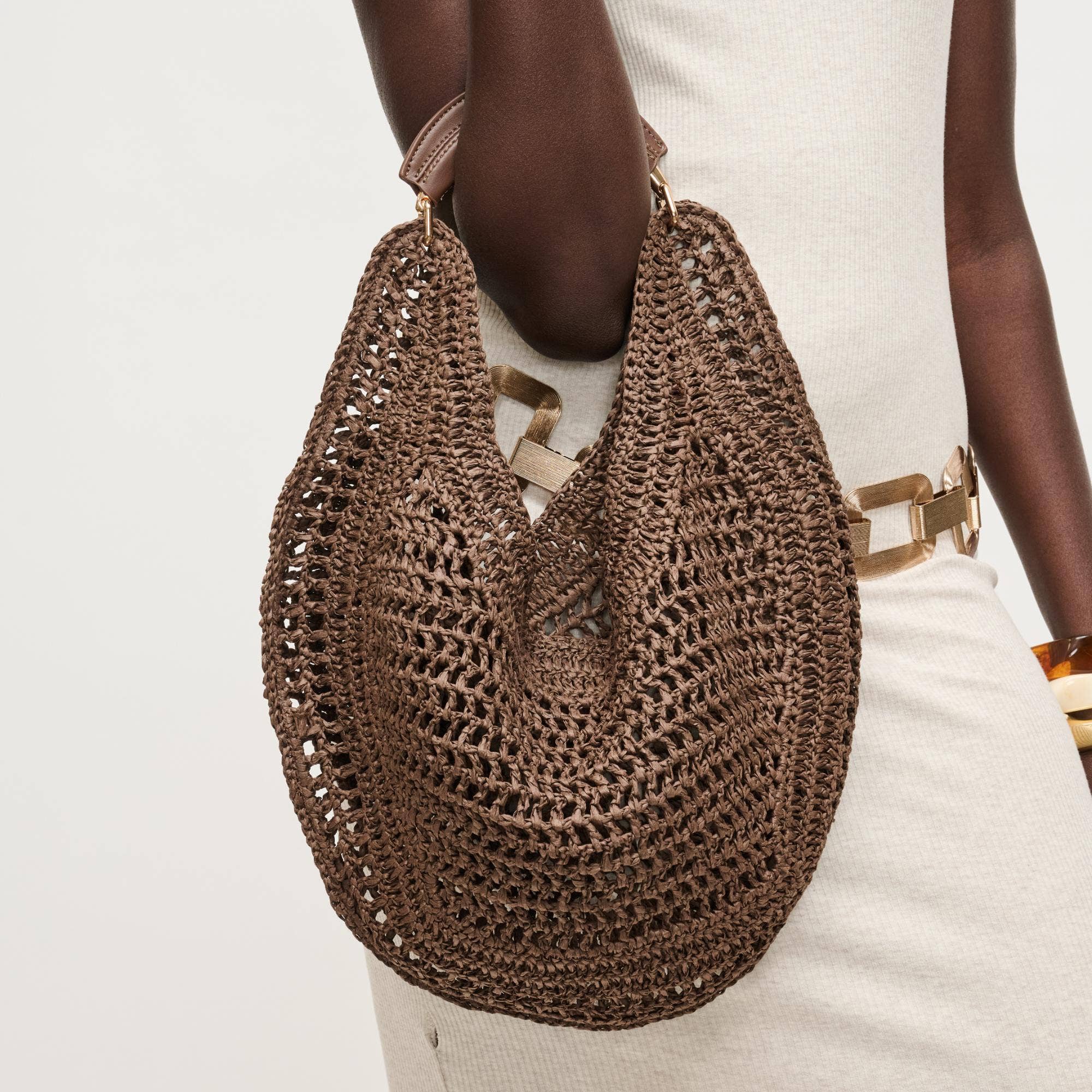 Crochet-woven summer hobo bag in rich chocolate brown designed for everyday wear and vacation styling