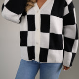 Preppy women’s knit cardigan styled with denim for an everyday fall outfit