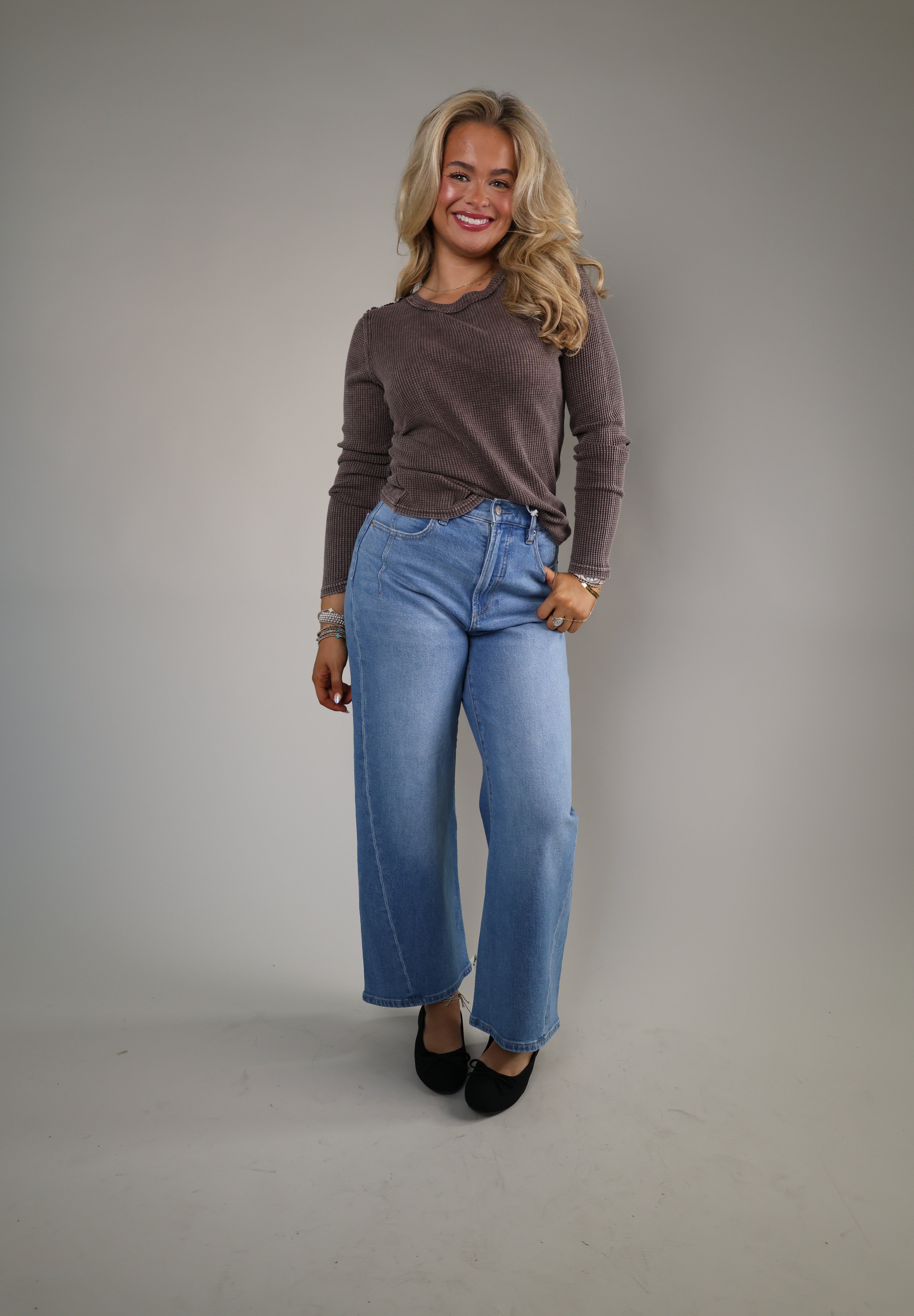 Fitted women’s thermal shirt styled under jackets and cardigans for cooler weather