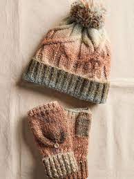 Chunky knit Rainbow Run beanie by Free People paired with coordinating ribbed convertible mittens.