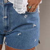 Carrie Floral Cutoffs
