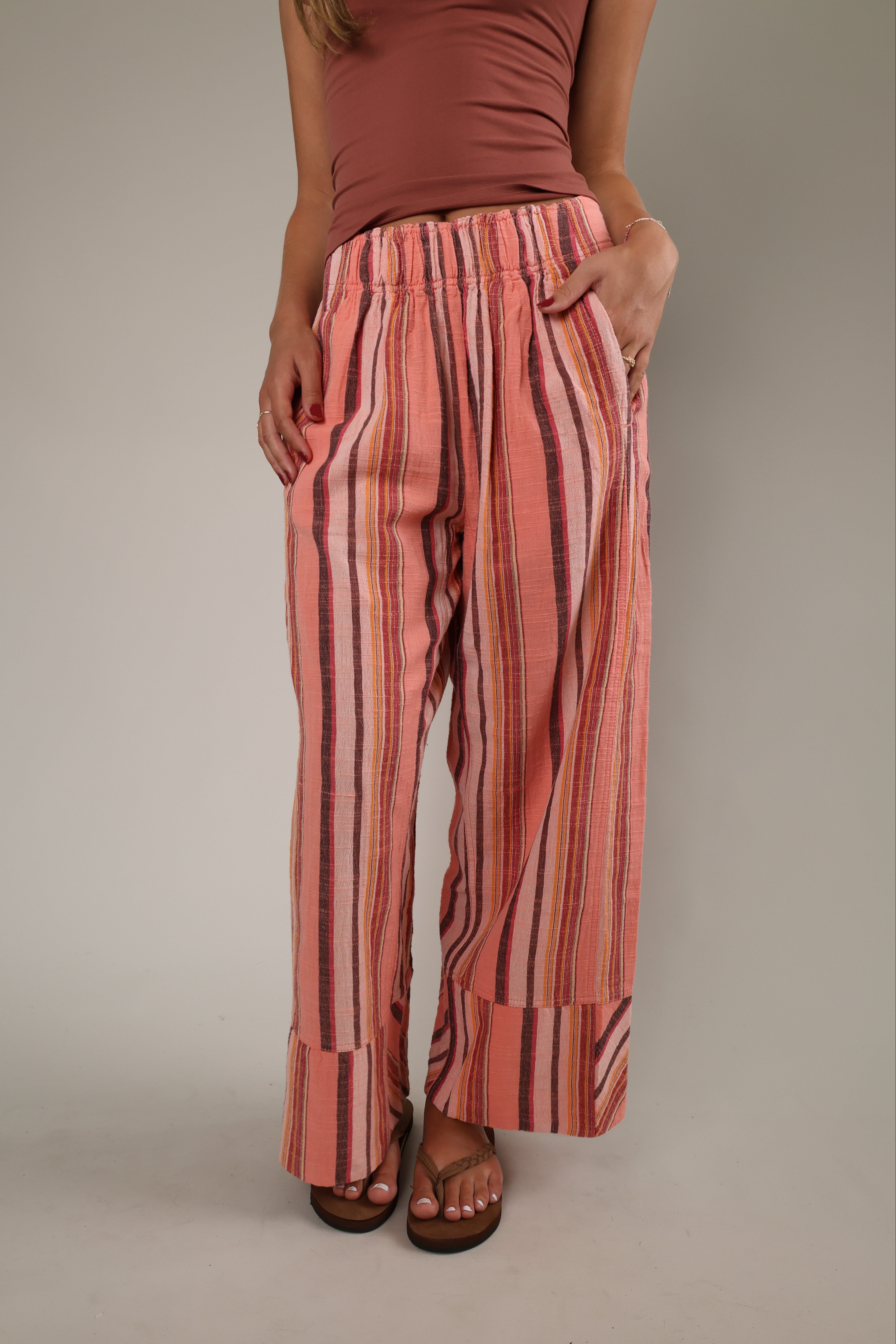 Women's lightweight striped pants featuring wide-leg silhouette, elastic waist, breathable linen blend fabric, beach vacation and resort wear style