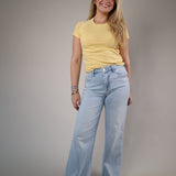 Light wash wide-leg jeans by Dear John with a flattering fitted waist and full-length flowy leg design for an effortless everyday look.