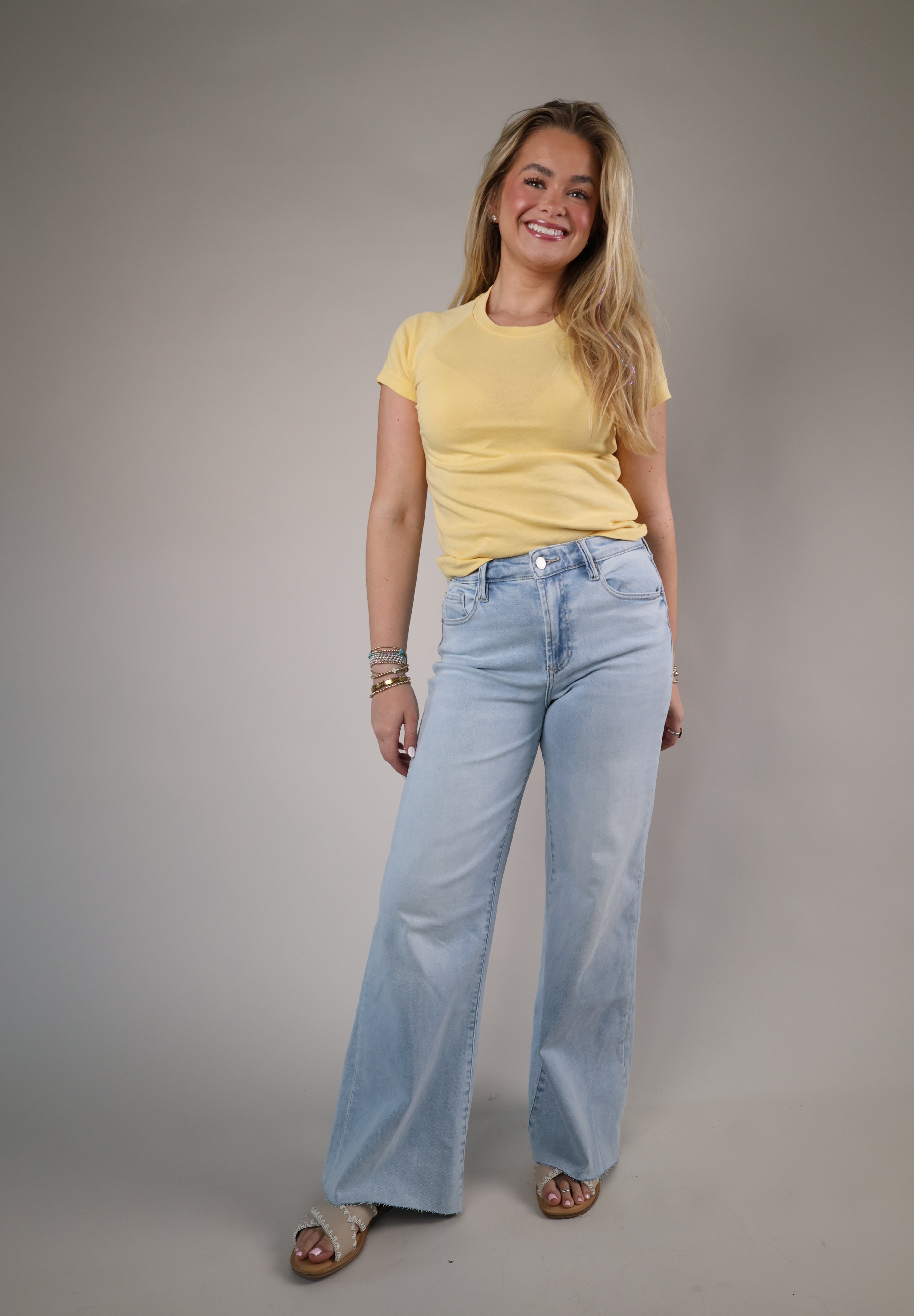 Light wash wide-leg jeans by Dear John with a flattering fitted waist and full-length flowy leg design for an effortless everyday look.