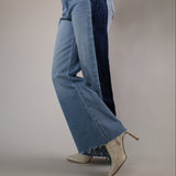Woman wearing Dear John Fiona Wide Leg Jeans in Tana featuring a high-rise fit, wide-leg silhouette, and contrast dark denim side panels.