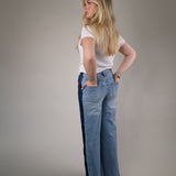 Dear John Fiona Wide Leg jeans in Tana styled with western boots, showcasing a vintage-inspired wash and relaxed modern fit.