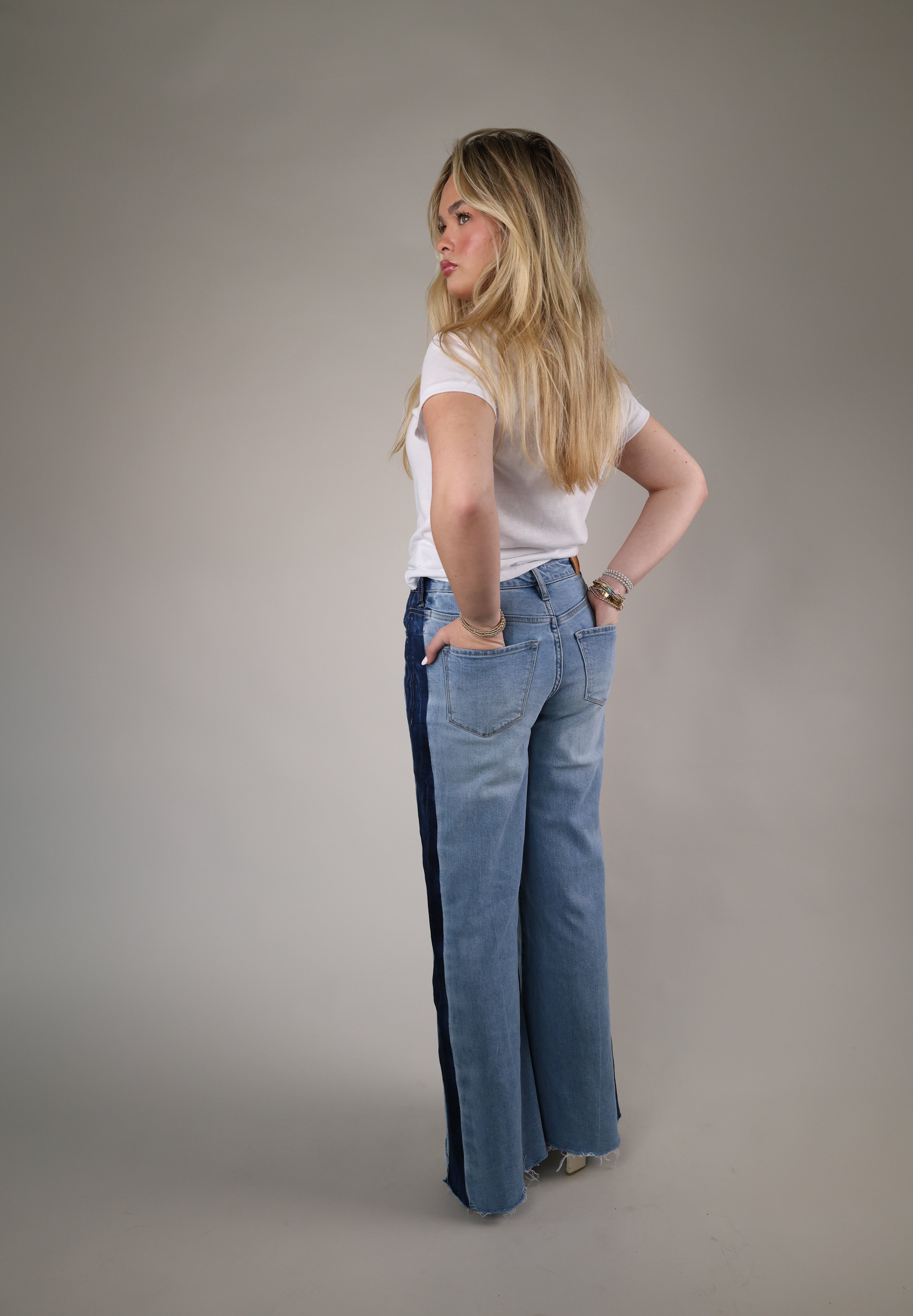 Dear John Fiona Wide Leg jeans in Tana styled with western boots, showcasing a vintage-inspired wash and relaxed modern fit.