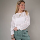 Z Supply Star of the Show Sweater styled with green patterned pants, showcasing a soft airy knit and casual silhouette.