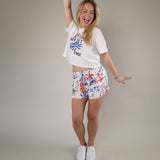 White Z Supply Vintage Sea Tee showcasing a coastal-inspired design with ocean wave graphics and a relaxed everyday silhouette.