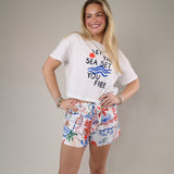 Casual graphic tee by Z Supply with blue wave illustrations, playful typography, and a lightweight vintage-inspired feel.
