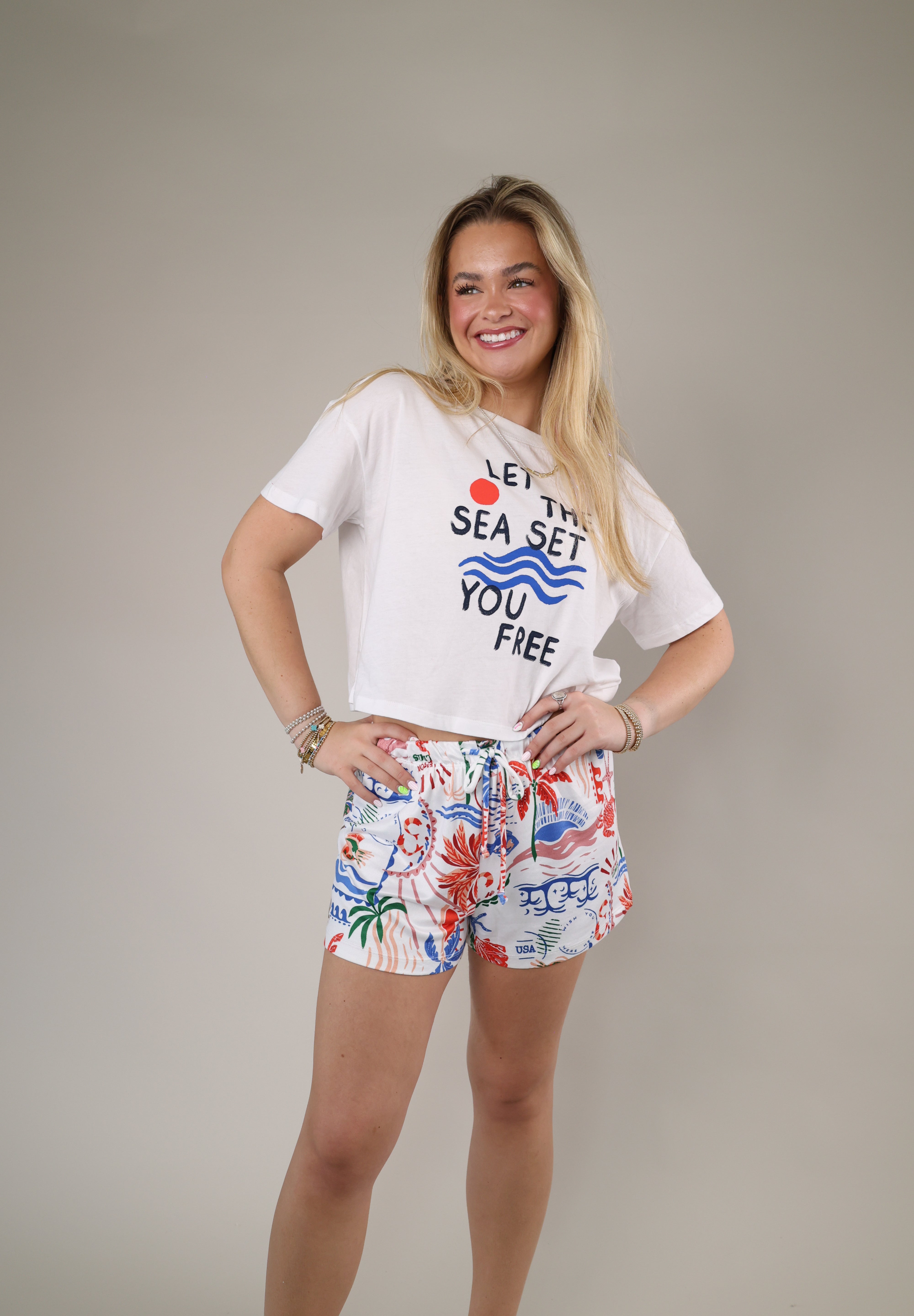 Casual graphic tee by Z Supply with blue wave illustrations, playful typography, and a lightweight vintage-inspired feel.