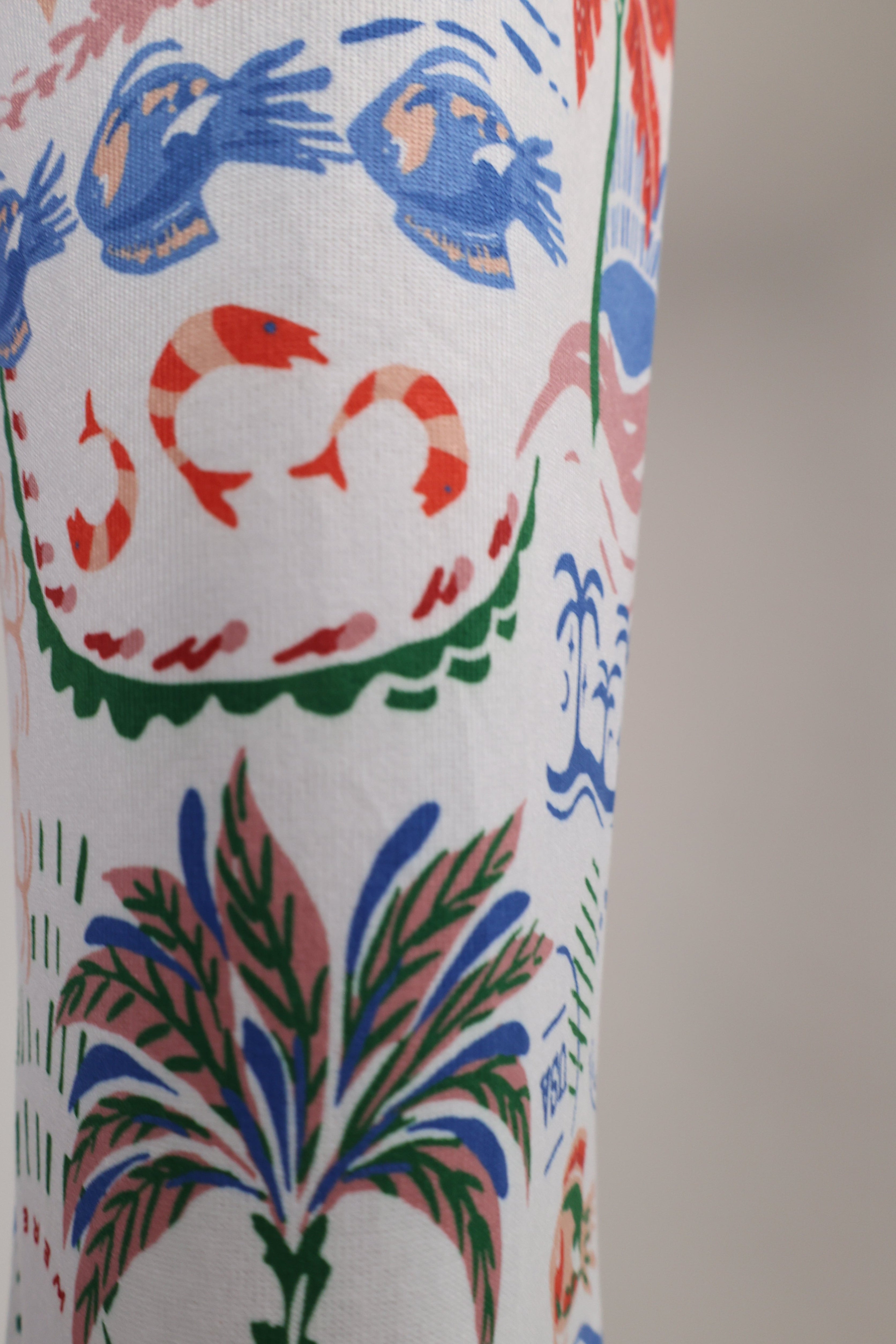 Casual printed getaway pants by Z Supply with a breezy lightweight feel and colorful resort-inspired design perfect for lounging or travel.