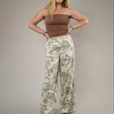 Z Supply Overlook Tiki Tide Linen Pant styled with sandals, showcasing a comfortable high-rise waist and relaxed beachy vibe.