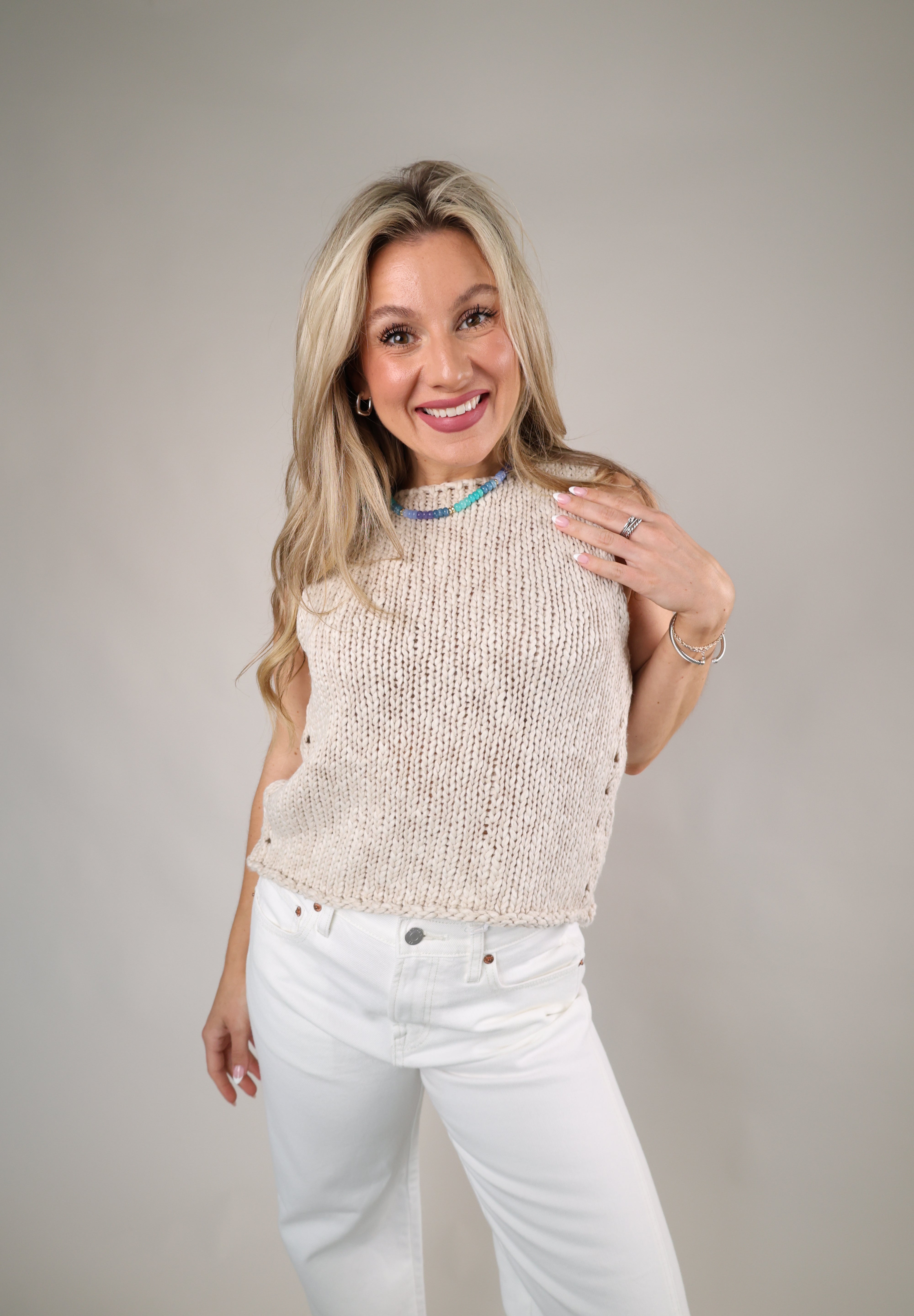 Relaxed fit sleeveless knit tank in a neutral tea shade perfect for layering or wearing solo