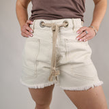 Free People white utility-style shorts perfect for pairing with tanks, graphic tees, and sandals all summer long