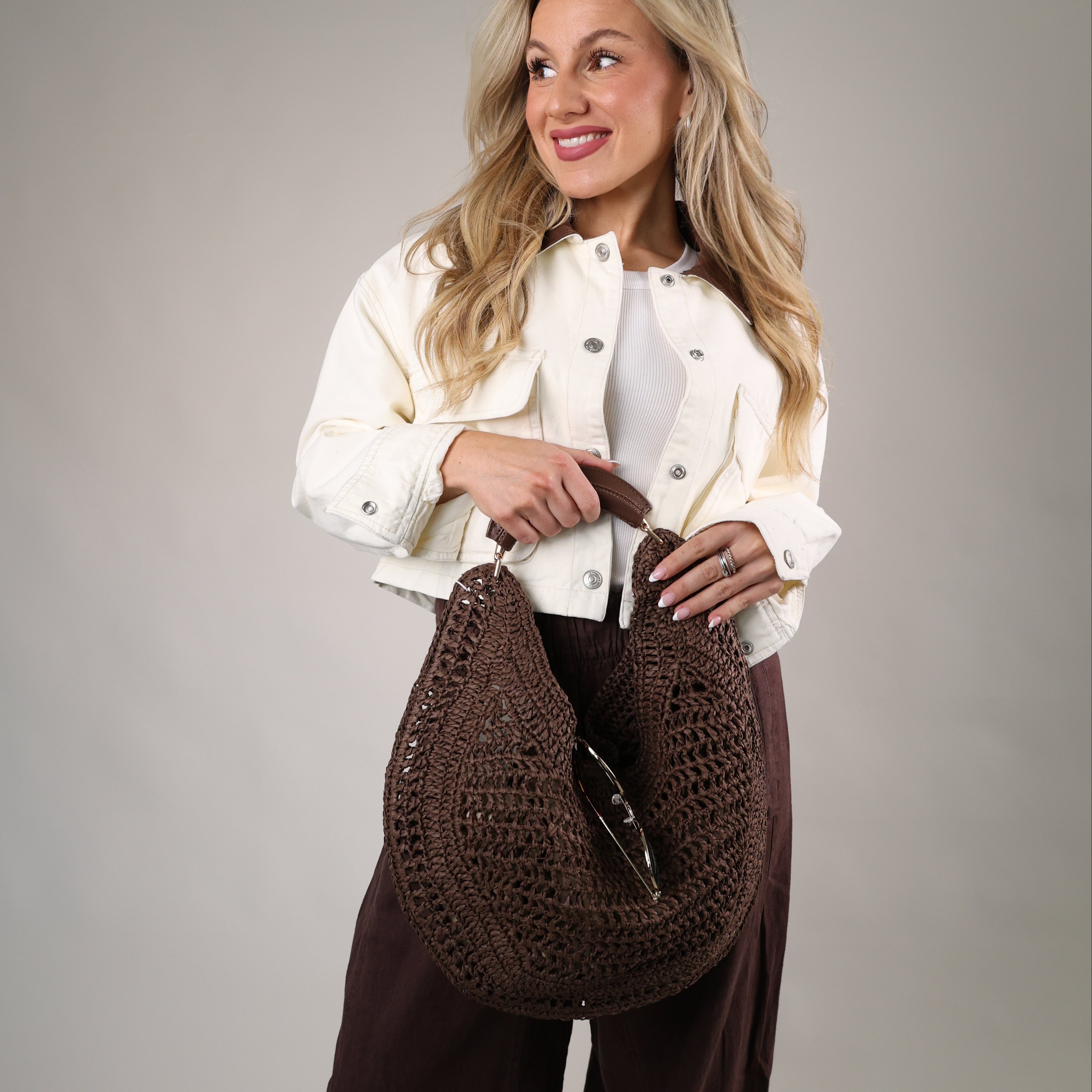 Lightweight woven Camden Hobo purse with crescent silhouette perfect for beach days and summer nights
