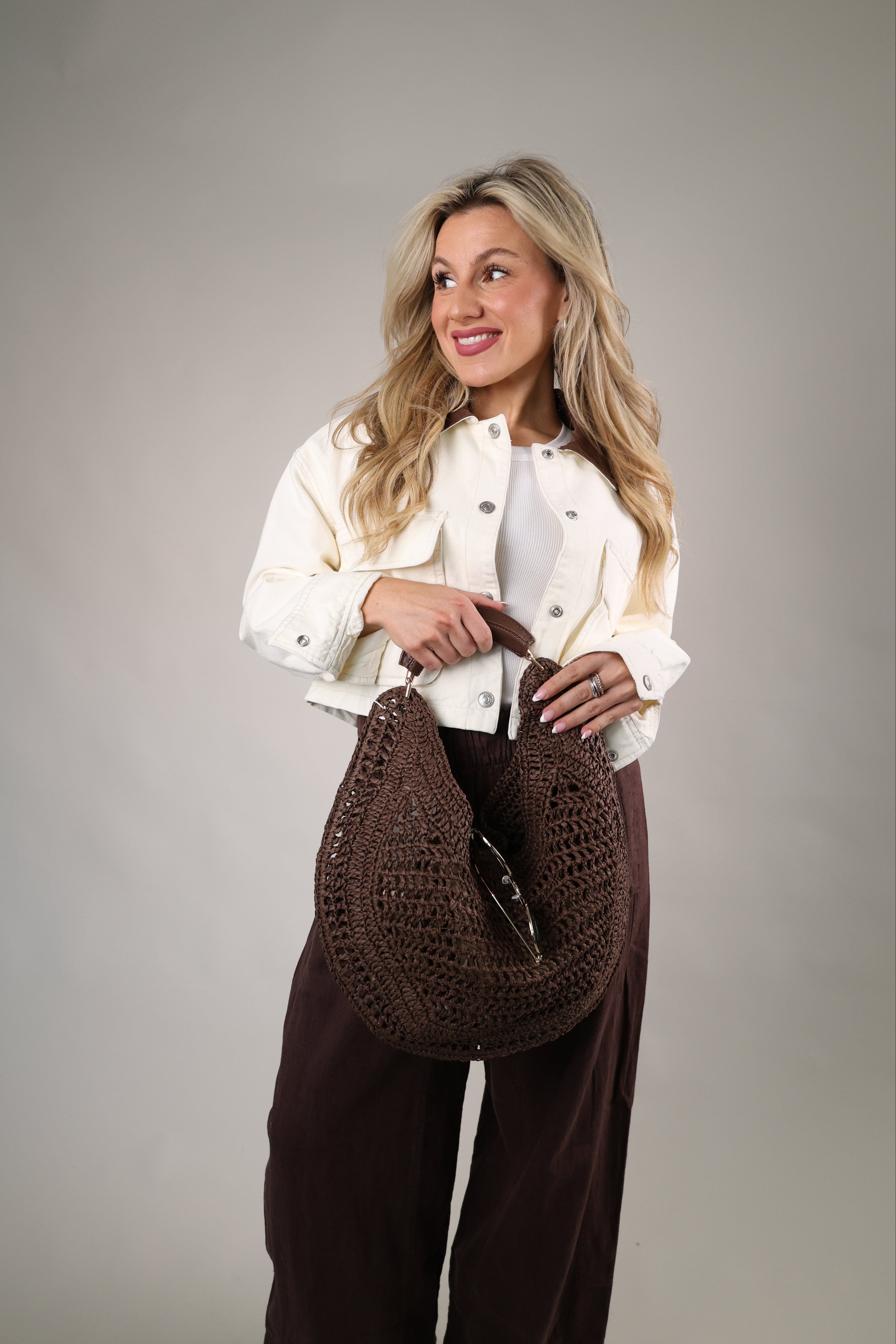 Lightweight woven Camden Hobo purse with crescent silhouette perfect for beach days and summer nights