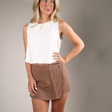 Palo Santo wrap-style skort featuring gold hardware accents, a polished high-waisted fit, and trendy boutique style