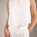 Modern sleeveless off white top from Shear Boutique featuring a breezy swing silhouette and elevated everyday summer look