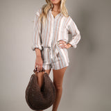 Island Coconut striped shorts featuring a breezy relaxed silhouette, lightweight fabric, and effortless vacation-inspired boutique style