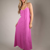 Feminine berry blush summer dress from Shear Boutique featuring a flattering midi length silhouette and elegant comfortable fit