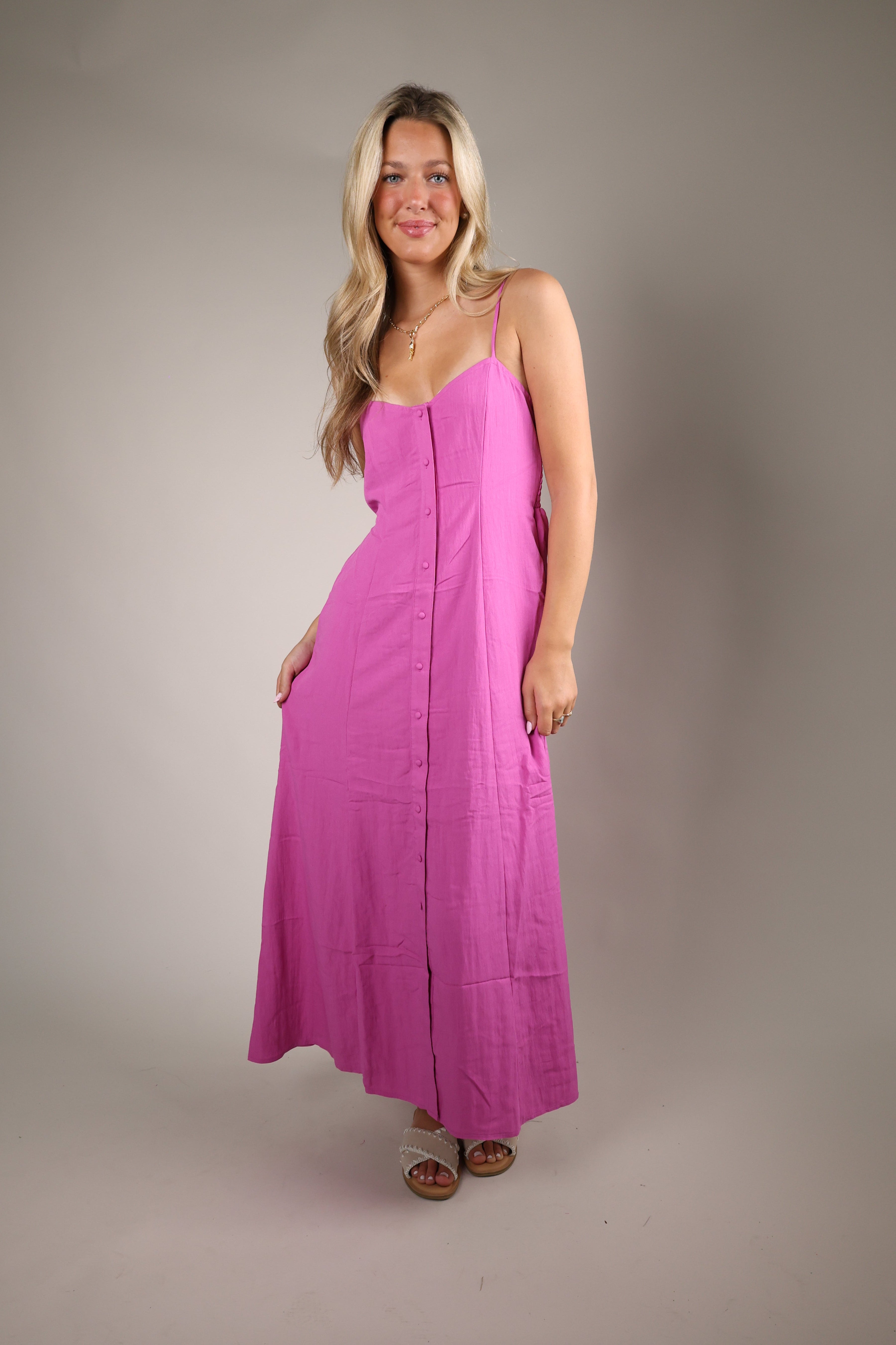 Feminine berry blush summer dress from Shear Boutique featuring a flattering midi length silhouette and elegant comfortable fit