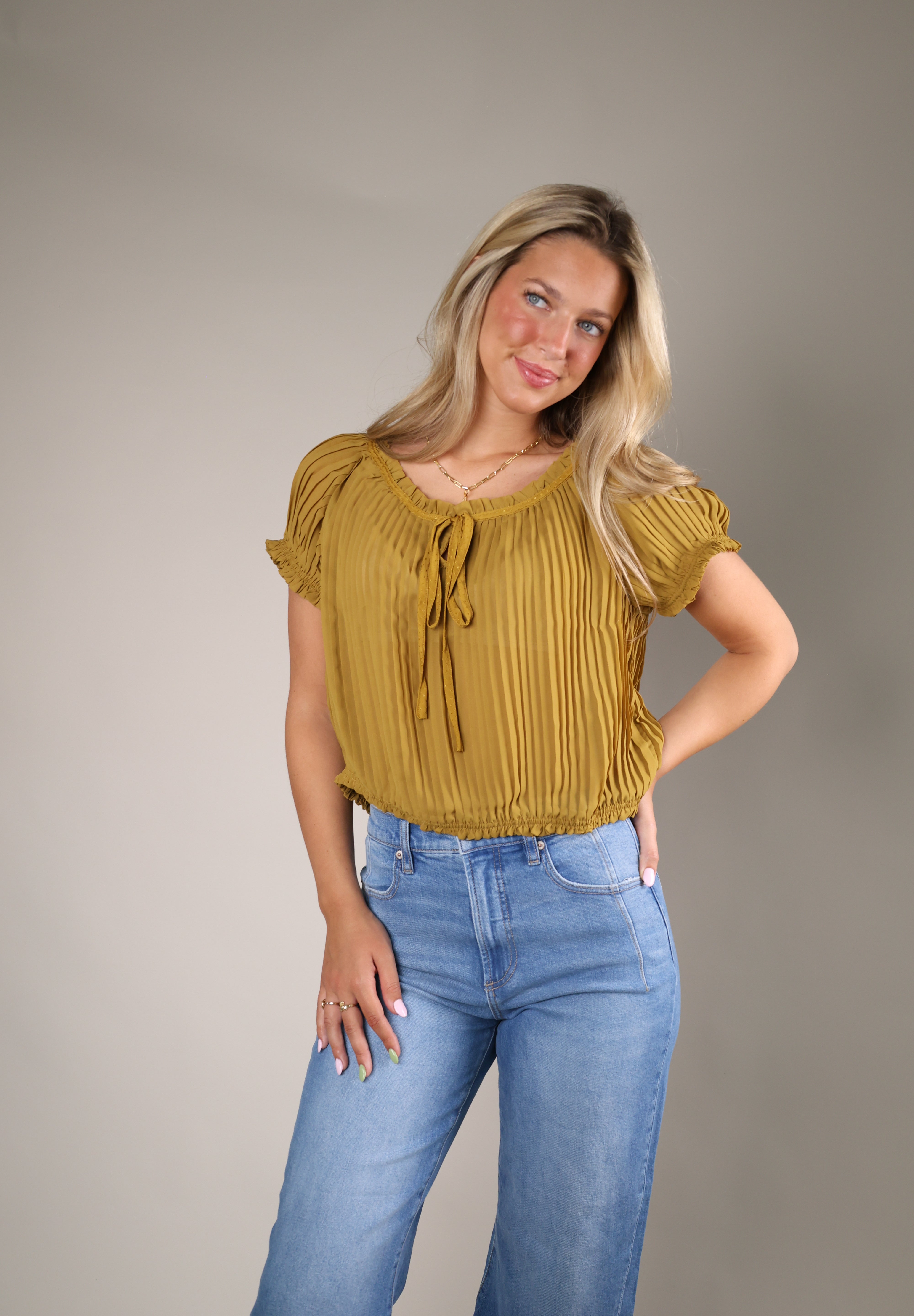 Shear Boutique Theodora Top styled with white denim, trousers, or shorts for an effortlessly polished warm-weather outfit