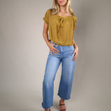 Theodora Top, a romantic women’s summer blouse with airy fabric, soft puff sleeves, and timeless everyday elegance from Shear Boutique