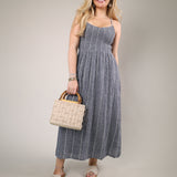 Striped maxi dress black vertical stripe smocked bodice flowy summer outfit