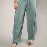 Blue stripe cotton pants with barrel leg silhouette and drawstring waist relaxed fit