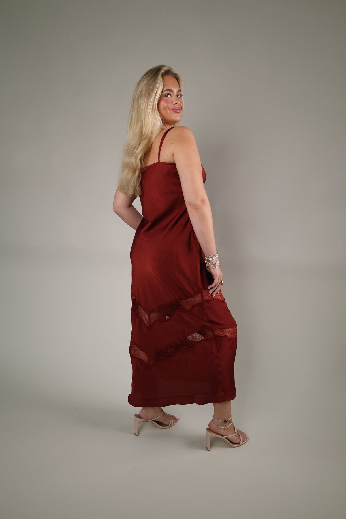 Rich Velvet Rouge satin midi dress with delicate lace insets and flattering feminine silhouette