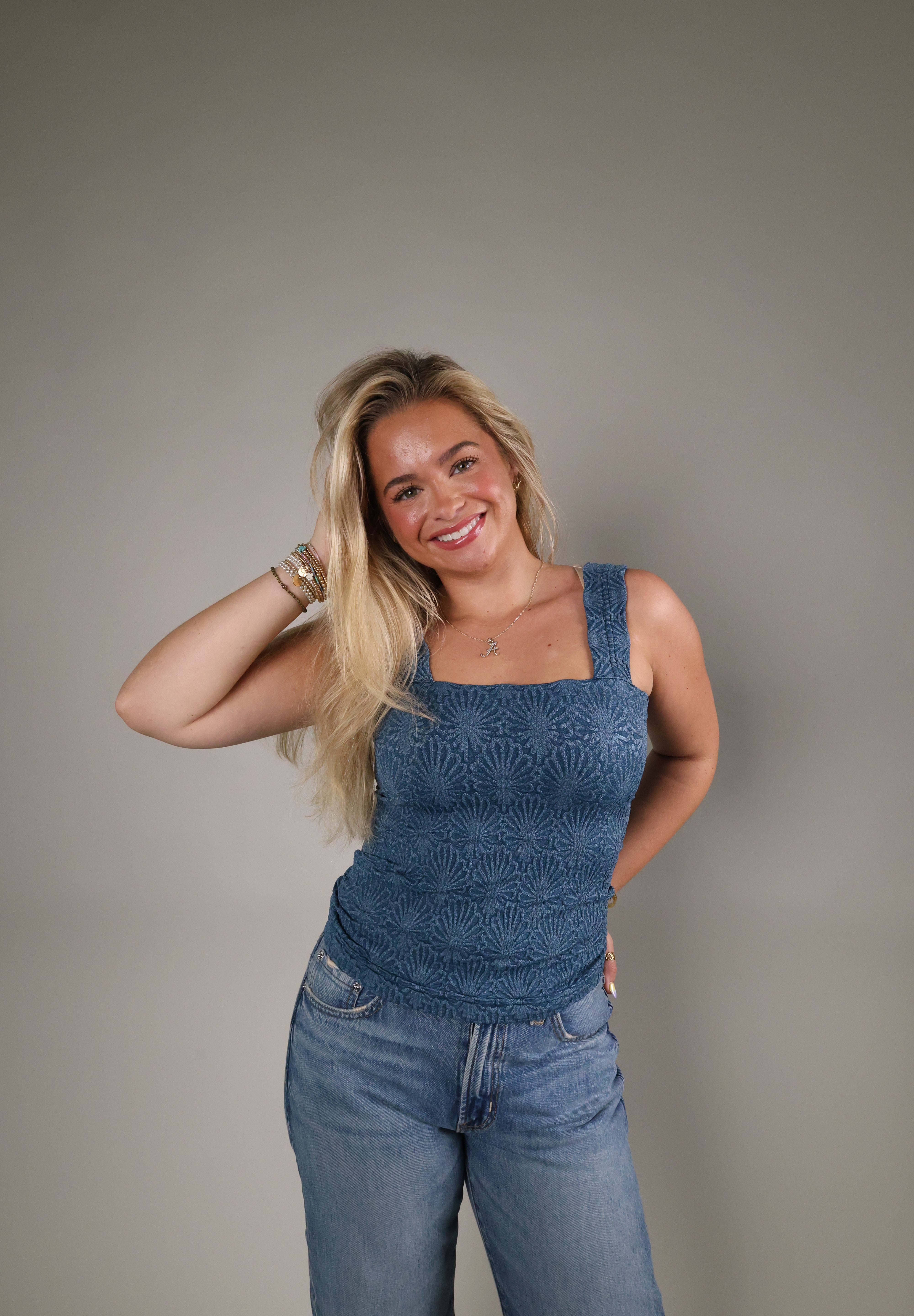 Women’s Deep Sea Blue lace textured top available at Shear Boutique in Olney, Maryland