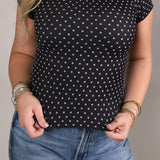 Soft stretchy polka dot top with cap sleeves and smooth seamless construction