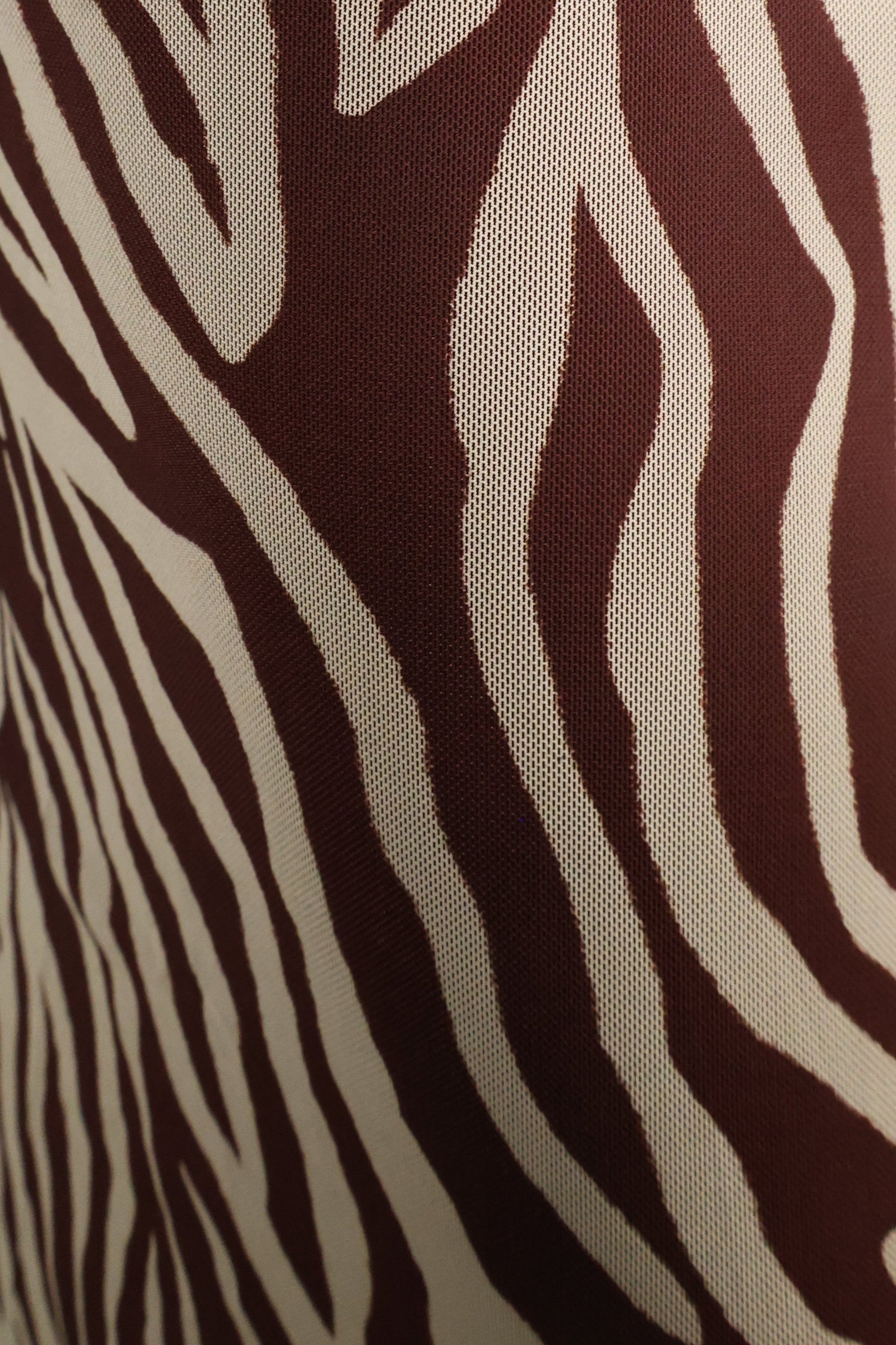 Women’s Velvet Rouge zebra midi dress available at Shear Boutique in Olney, Maryland