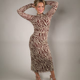 Velvet Rouge zebra print mesh dress with flattering midi length and elevated statement style